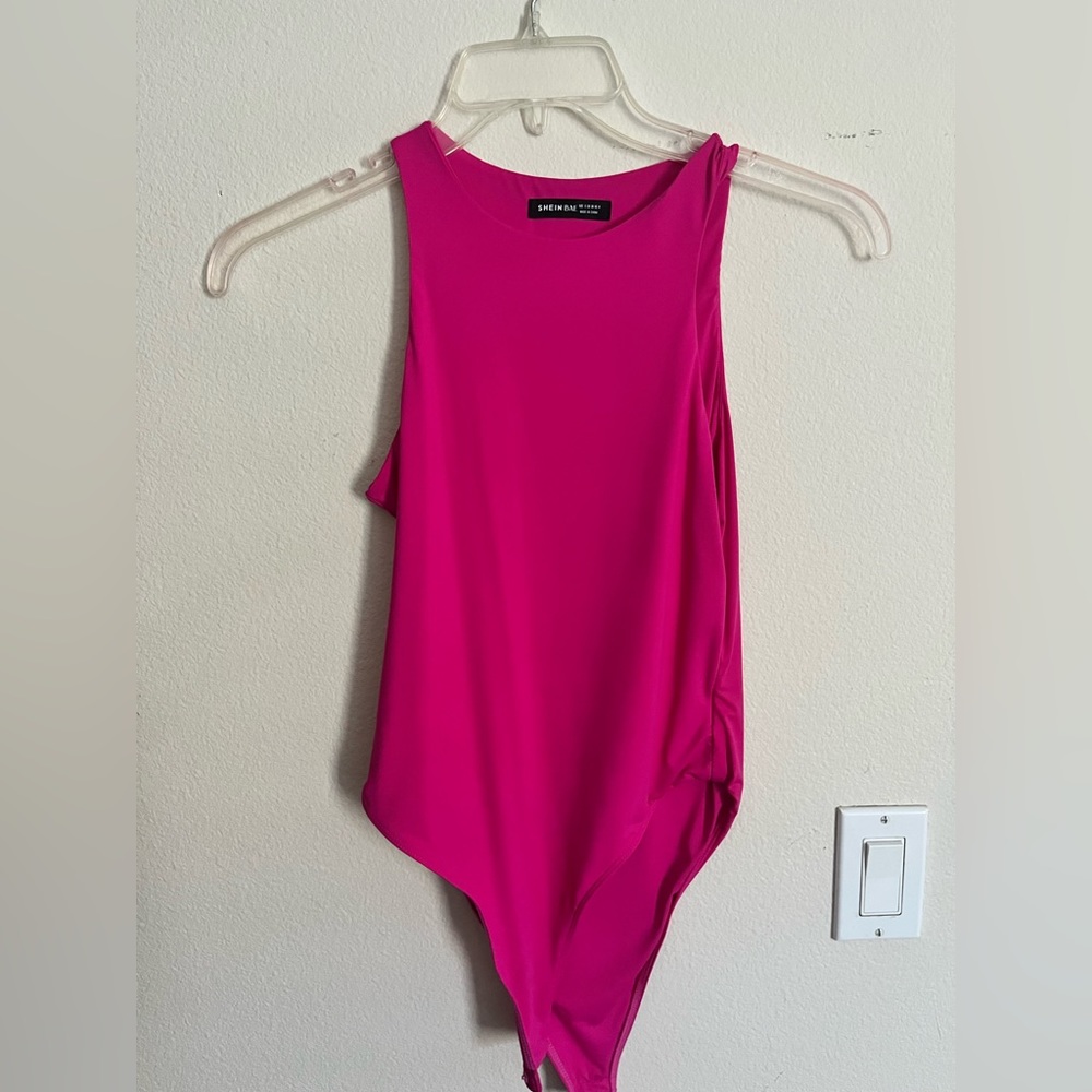 Hot pink body suit